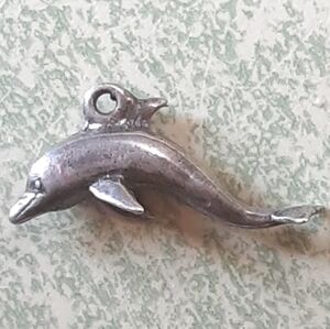 Antique vintage sterling silver dolphin charm